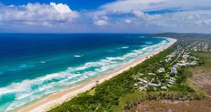 Open concept living with 2 en suite bedroom cottage 1 minute walk to the beach.