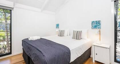 Open concept living with 2 en suite bedroom cottage 1 minute walk to the beach.