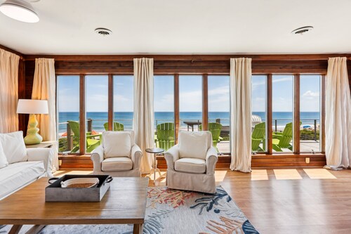 Beachfront Duck retreat with 4 king bedrooms, 3 baths, and private beach walkway.
