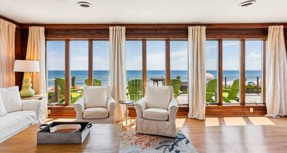 Beachfront Duck retreat with 4 king bedrooms, 3 baths, and private beach walkway.