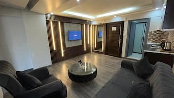 Una televisión, Netflix, Hulu, películas de estreno