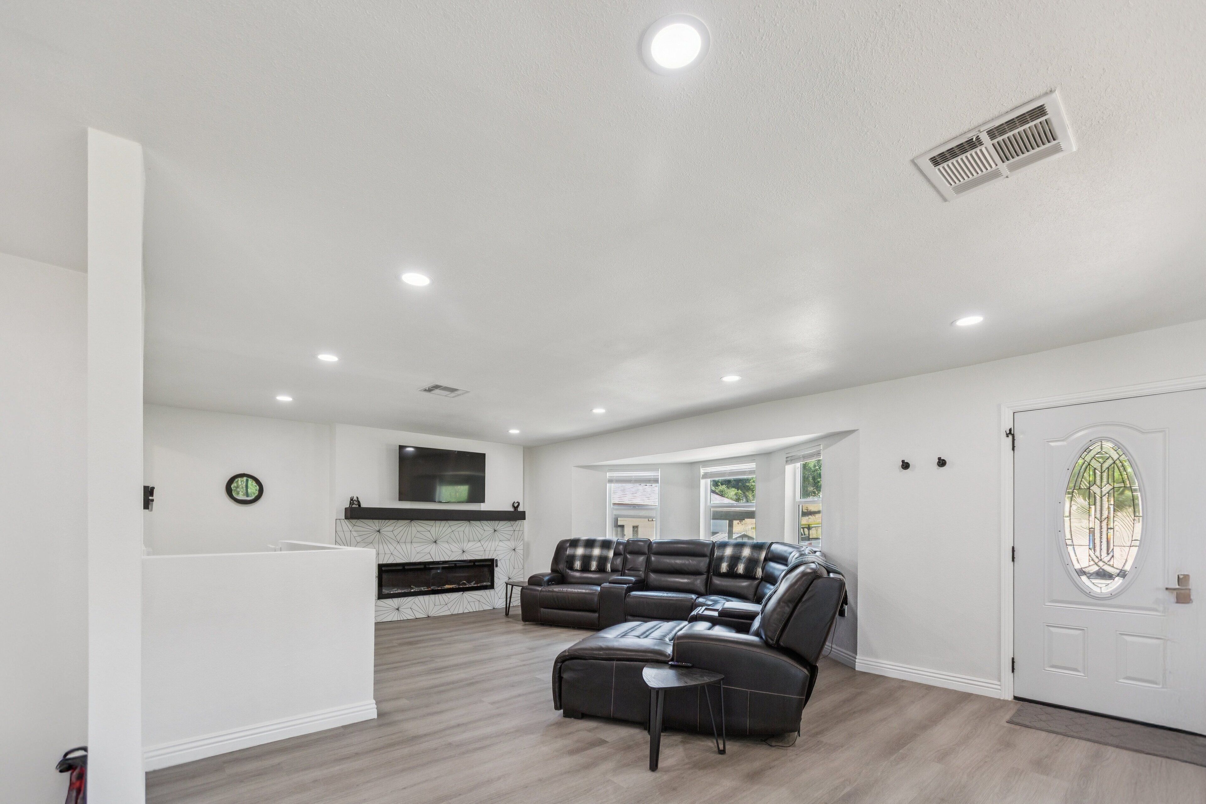 TV, fireplace, books