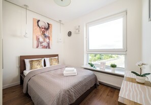 1 habitación, tabla de planchar con plancha, wifi y ropa de cama 