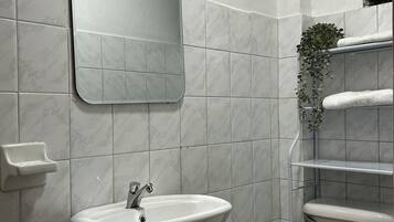 Comfort Studio | Bathroom | Shower, towels, soap, toilet paper