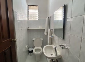 Comfort Studio | Bathroom | Shower, towels, soap, toilet paper