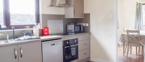 Fridge, microwave, oven, cookware/dishes/utensils