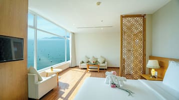 Executive Studio Suite, 1 King Bed, Sea View | Minibar, desk, blackout curtains, soundproofing