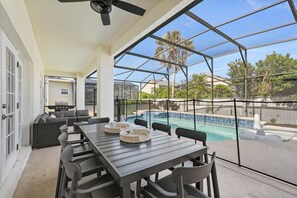 Outdoor dining - Modern Villa w/ Pool, Hot Tub & Theater Room! (Kissimmee)