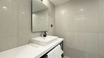 Basic Double Room | Bathroom | Rainfall showerhead, hair dryer, electronic bidet, towels