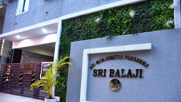A building entrance with a sign reading "Sri Balaji" and a TPR logo. - Tech Park Residency (Bengaluru)