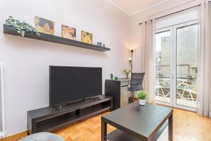 Apartment, 1 Bedroom, Kitchen, City View | Living room | 53-inch Smart TV with digital channels, streaming services