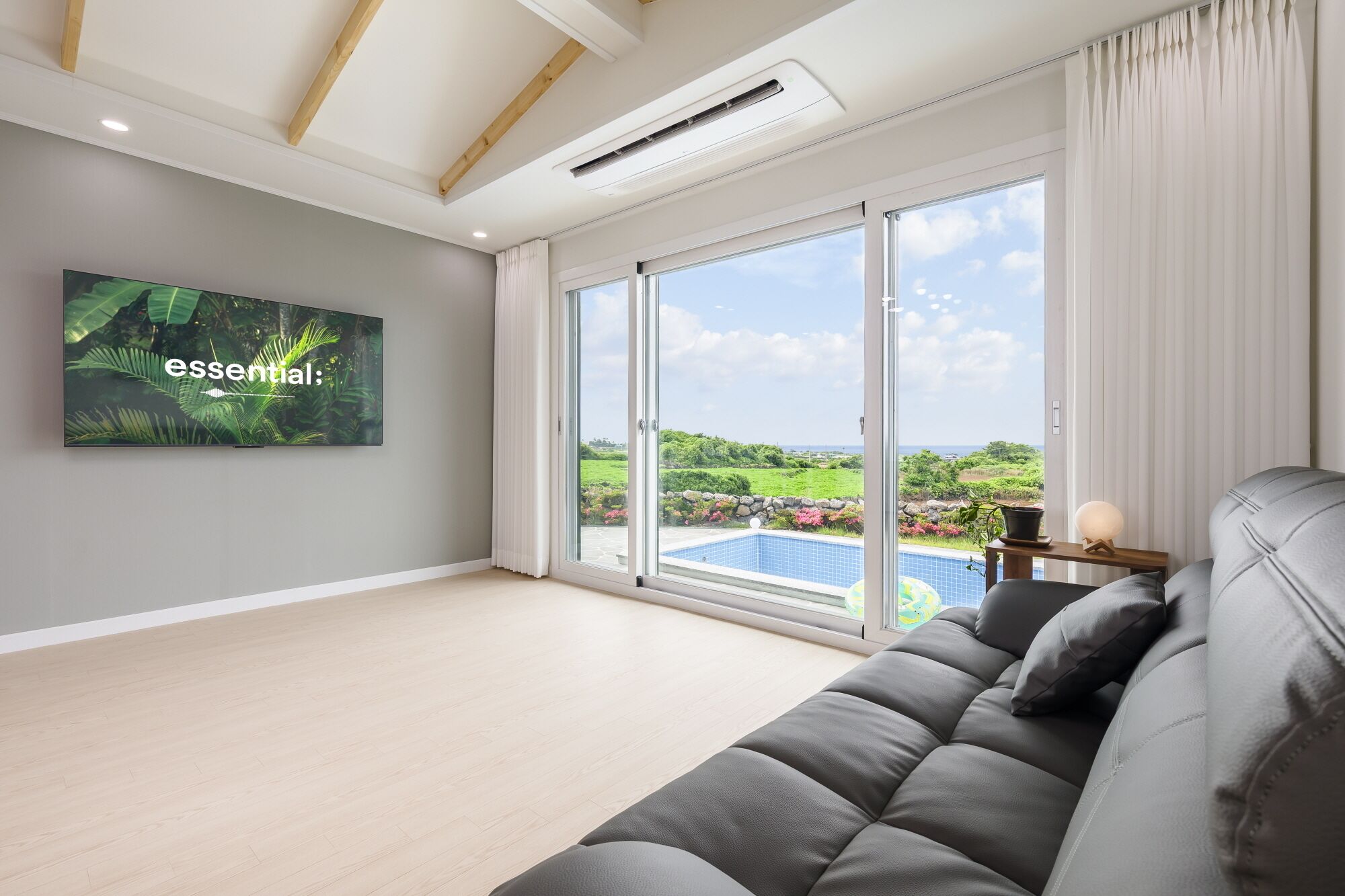 30PY Private Pool Villa | Living area | 66-inch LED TV with cable channels