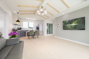 30PY Private Pool Villa | Living area | 66-inch LED TV with cable channels