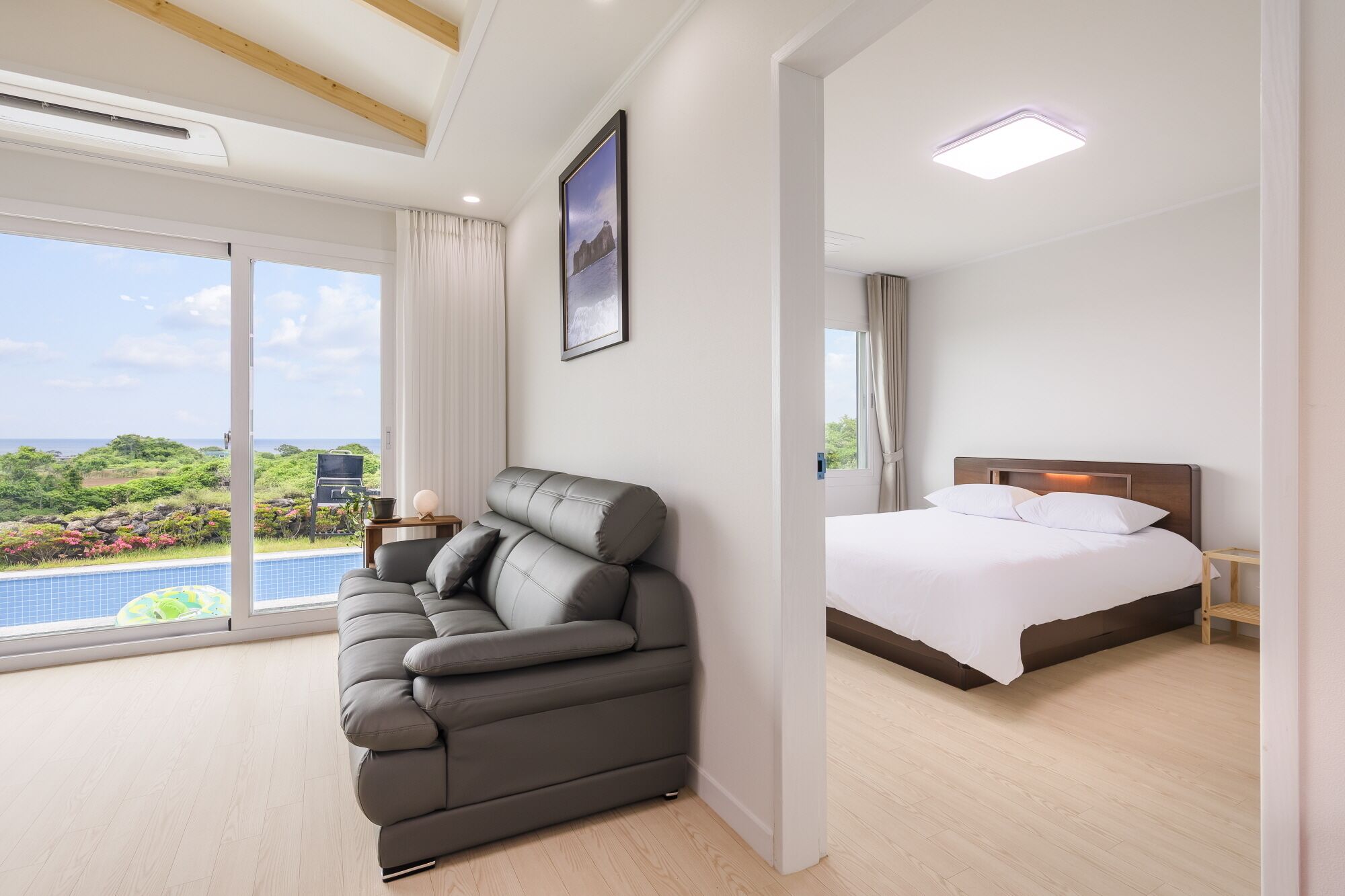 30PY Private Pool Villa | Living area | 66-inch LED TV with cable channels