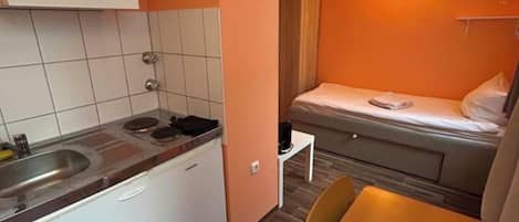 Chambre Simple | Ameublement personnalisé, fer et planche à repasser, Wi-Fi gratuit