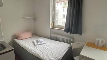 Twin Room | Bathroom | Shower, towels, soap, toilet paper