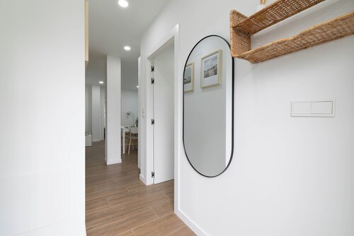 Apartment 'Ría De San Cosme Candida' with Mountain View, Shared Garden and Air Conditioning