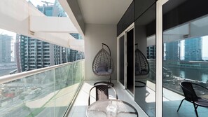 Deluxe Apartment, Balcony, Lake View | Terrace/patio - Keyrock Living - 1BR Lake View at Reva (Dubai)