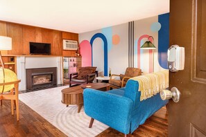 Smart TV, fireplace, books