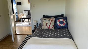 Family Apartment, Multiple Bedrooms, Mountainside (Scenic By The Sea Patterdale) | 3 bedrooms, laptop workspace, iron/ironing board, free WiFi