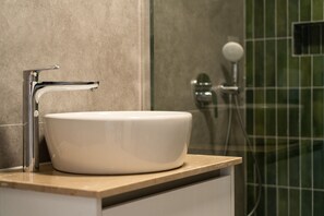 Shower, hair dryer, towels, toilet paper