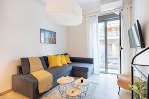 Apartment, 2 Bedrooms, Kitchen, City View | Living room | 43-inch Smart TV with digital channels, streaming services