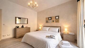 Familienapartment, Mehrere Schlafzimmer (Le Conchiglie Di Grace) | 2 Schlafzimmer, WLAN, Bettwäsche