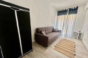 32-inch flat-screen TV with satellite channels
