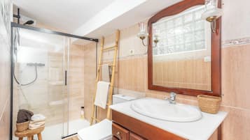 Shower, towels, toilet paper