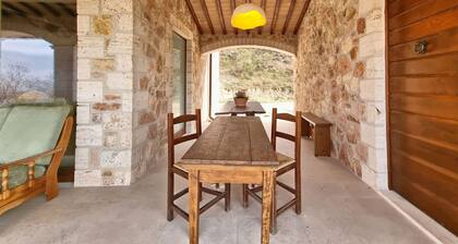 Farmhouse with panoramic views surrounded by forest in the center of Umbria