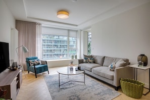Apartamento, para não fumantes, vista para a cidade | Área de estar