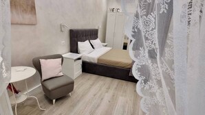 2 dormitorios, tabla de planchar con plancha, Internet y ropa de cama