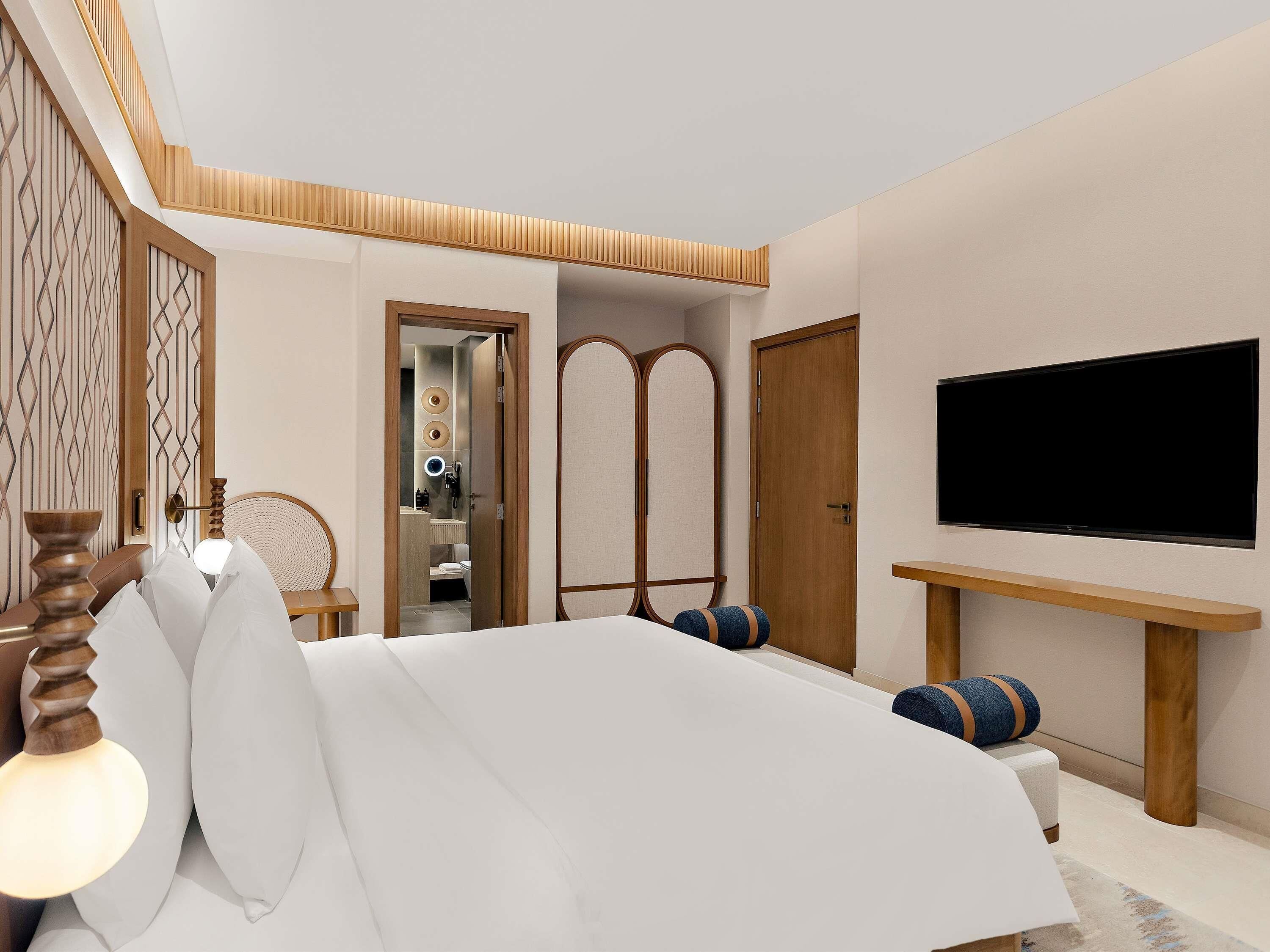Apartment, 1 Bedroom | Minibar, desk, laptop workspace, soundproofing