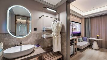 Premium bedding, free minibar, in-room safe, laptop workspace