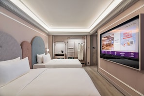 Deluxe-rum - 2 enkelsängar | Sängtillbehör av högsta kvalitet och gratis produkter i minibar