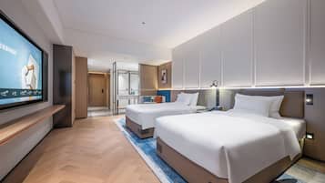 Premium bedding, down duvets, free minibar items, individually decorated