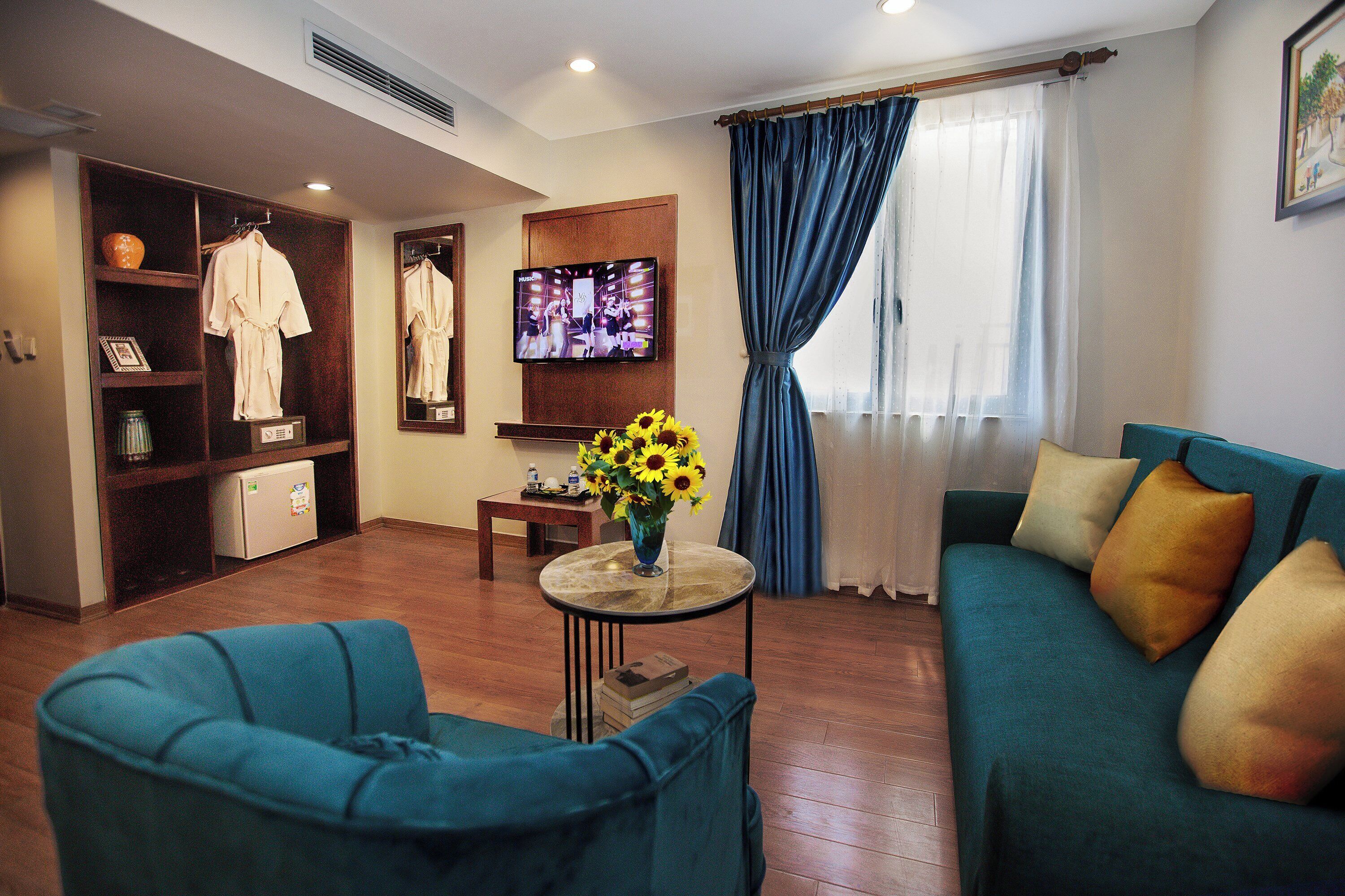 Junior tweepersoonskamer, 2 slaapkamers | Woonruimte | Televisie