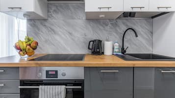 Condo économique, 1 chambre, non-fumeur, salle de bain privée | Cuisinette privée | Surface de cuisson, vaisselle et ustensiles