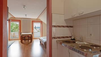 Fridge, microwave, stovetop, coffee/tea maker