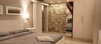 Elegant attic with Dolomites view, relaxation and nature in Levico Terme.