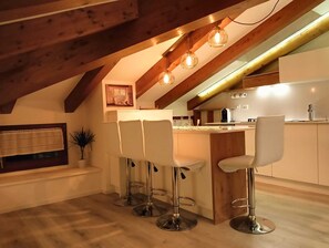 Fridge, oven, stovetop, dishwasher - Elegant attic with Dolomites view, relaxation and nature in Levico Terme. (Levico Terme)