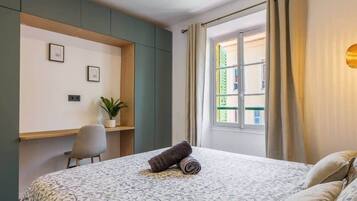 2 slaapkamers, een strijkplank/strijkijzer, gratis wifi, beddengoed