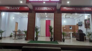 A hotel entrance with a sign reading "Vijay Residency" on Yamunotri Road, Barkot. - Hotel Vijay Residency Barkot (Rajgarhi)
