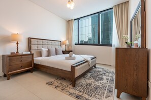 3 chambres, coffres-forts dans les chambres, fer et planche à repasser