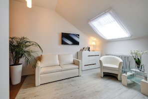 Chambre Confort double | Espace de travail pour ordinateurs portables, lit d’appoint (supplément)