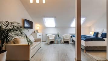 Habitación doble Confort | Espacio para trabajar con laptop, camas extra y wifi gratis