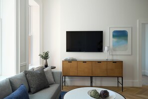 50-inch flat-screen TV with cable channels