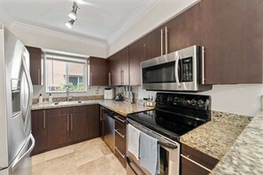 House, Multiple Beds, Pool Access, Pool View (Ocean House) | Private kitchen | Fridge, microwave, oven, stovetop