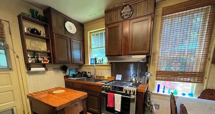 Charming 2-bedroom cottage with fenced yard is pet friendly and waiting for you!