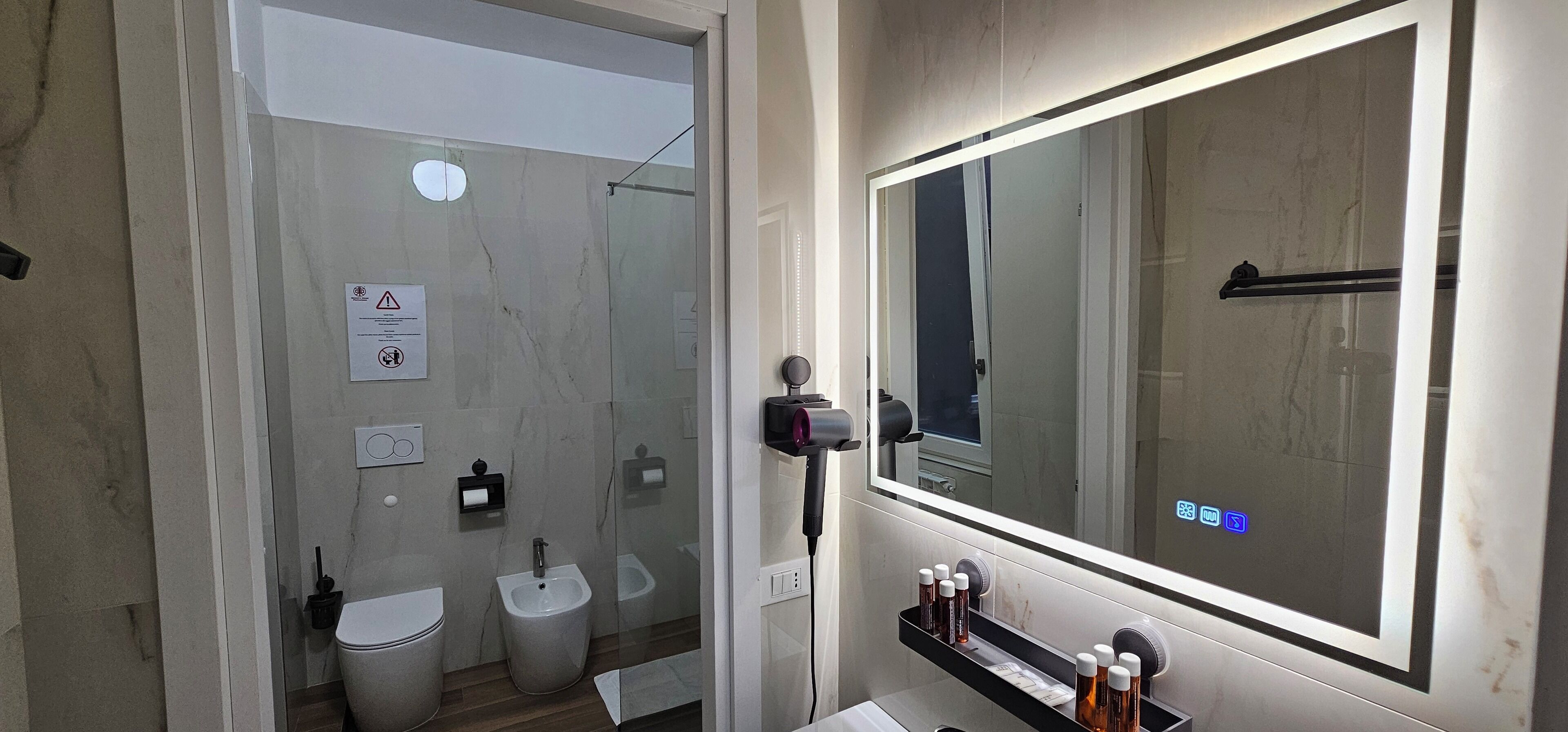 Deluxe Room | Bathroom | Hair dryer, slippers, towels, soap